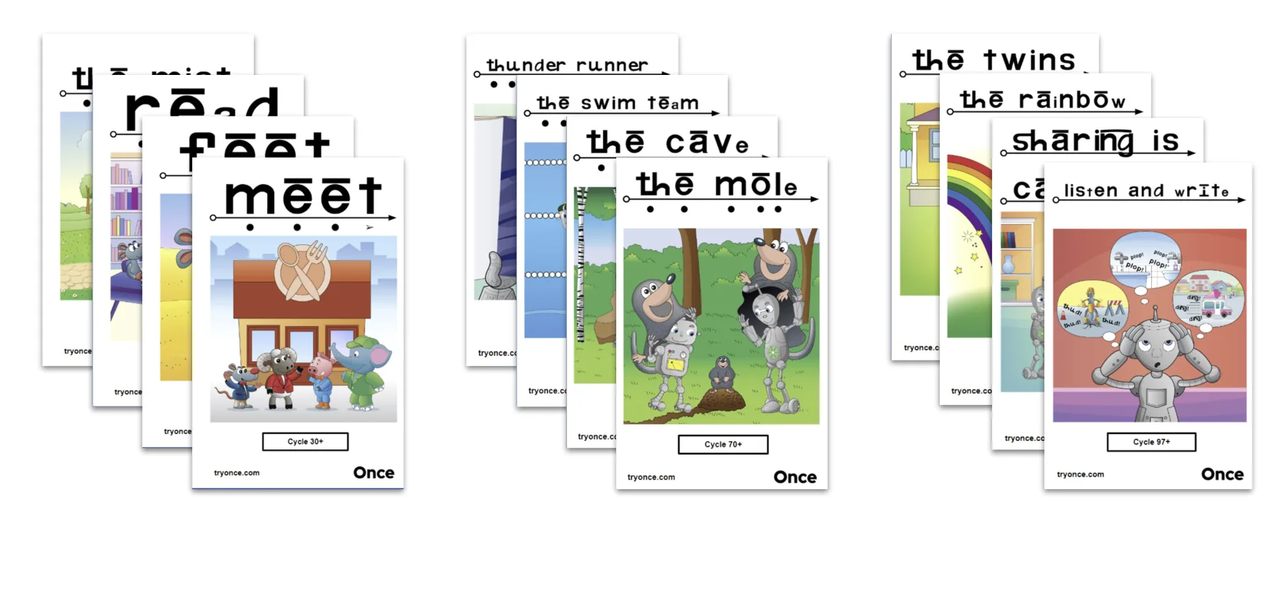 Stacks of Once decodable books with titles such as Read, Meet, The Cave, The Mole, The Twins, and Sharing Is
