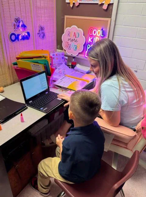 A young student and instructor in a one-on-one Once lesson